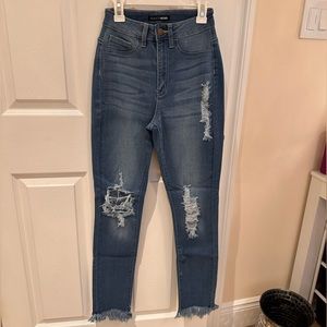 Fashion Nova High rise fringe bottom Jean size 1/25